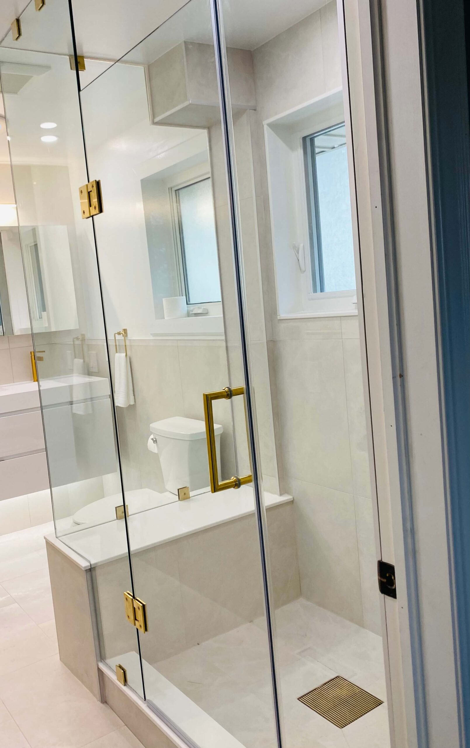 Glass shower enclosure