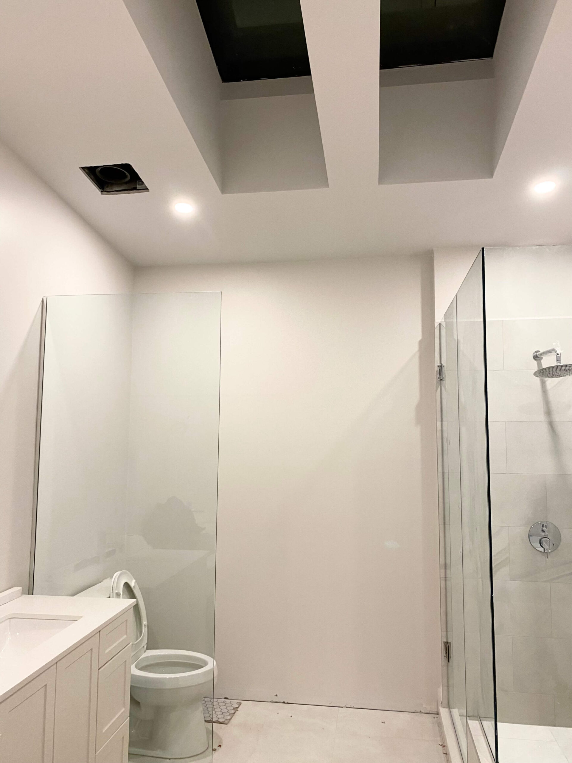 Glass shower enclosure